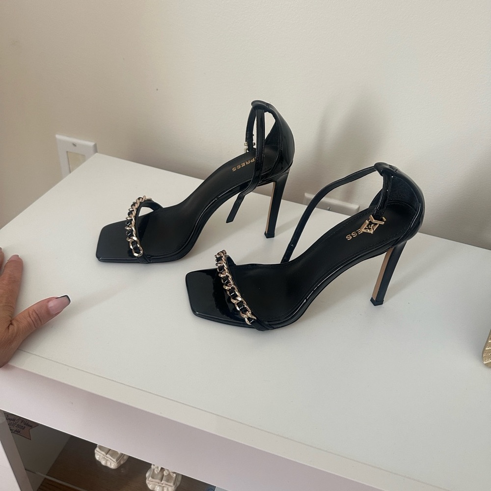 Express Black Heels with Gold Chain Accent